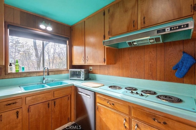 kitchen with a sink, stainless steel dishwasher, under cabinet range hood, electric cooktop, and light countertops