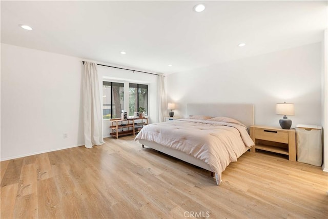 9735 Reseda Blvd Unit 56, Northridge, CA 91324 - bedroom with light wood-style flooring and recessed lighting