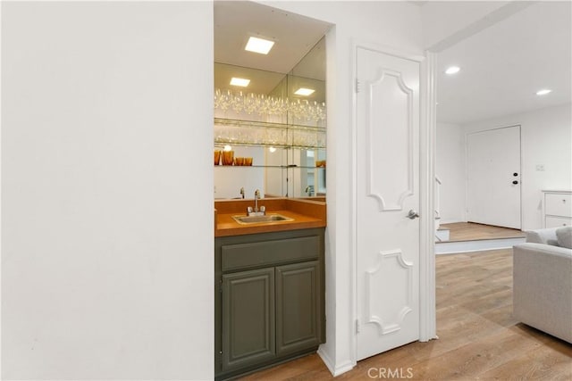 9735 Reseda Blvd Unit 56, Northridge, CA 91324 - indoor wet bar with light wood-style floors and recessed lighting
