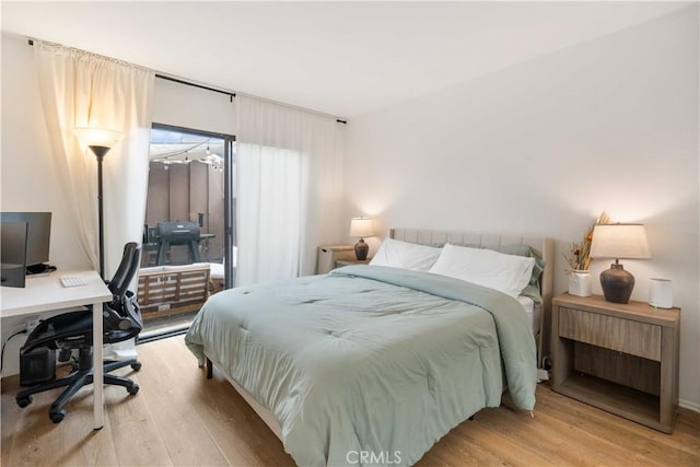 9735 Reseda Blvd Unit 56, Northridge, CA 91324 - bedroom featuring light wood finished floors and an office area