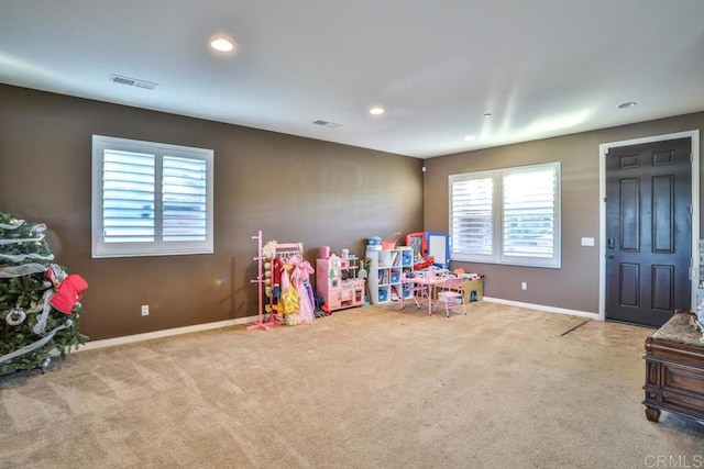 recreation room featuring carpet floors, baseboards, and recessed lighting