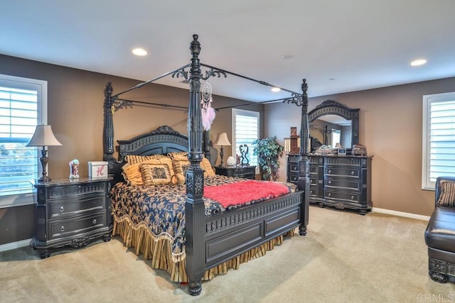 carpeted bedroom with baseboards and recessed lighting