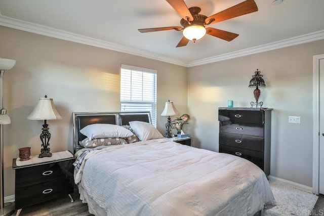 bedroom featuring crown molding, baseboards, and ceiling fan