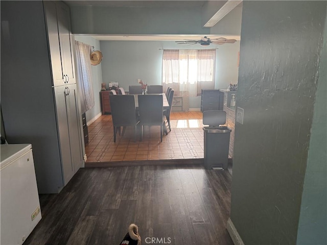 10146 Alpaca St, South El Monte, CA 91733 - dining space featuring dark wood-style floors, ceiling fan, and baseboards