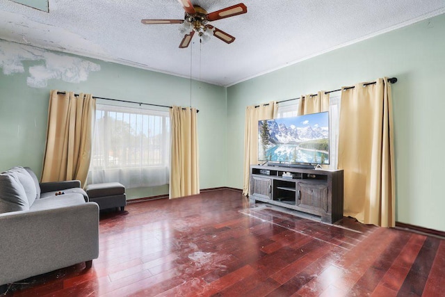 1703 W 25th St, Los Angeles, CA 90018 - living area with a ceiling fan, wood-type flooring, a textured ceiling, and crown molding