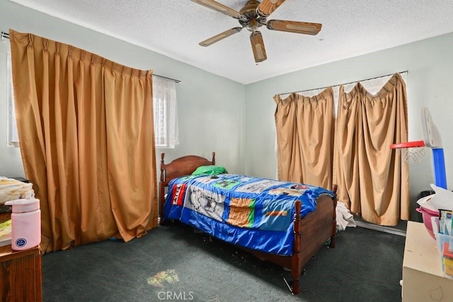 1703 W 25th St, Los Angeles, CA 90018 - bedroom featuring carpet flooring, a textured ceiling, and a ceiling fan