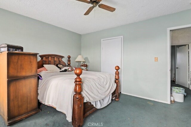 1703 W 25th St, Los Angeles, CA 90018 - carpeted bedroom with a textured ceiling, baseboards, and a ceiling fan