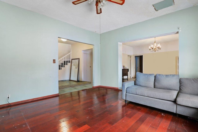 1703 W 25th St, Los Angeles, CA 90018 - living area with ceiling fan, hardwood / wood-style flooring, stairway, baseboards, and a chandelier