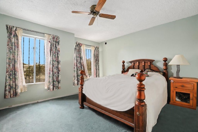 1703 W 25th St, Los Angeles, CA 90018 - carpeted bedroom featuring multiple windows, a textured ceiling, a ceiling fan, and baseboards