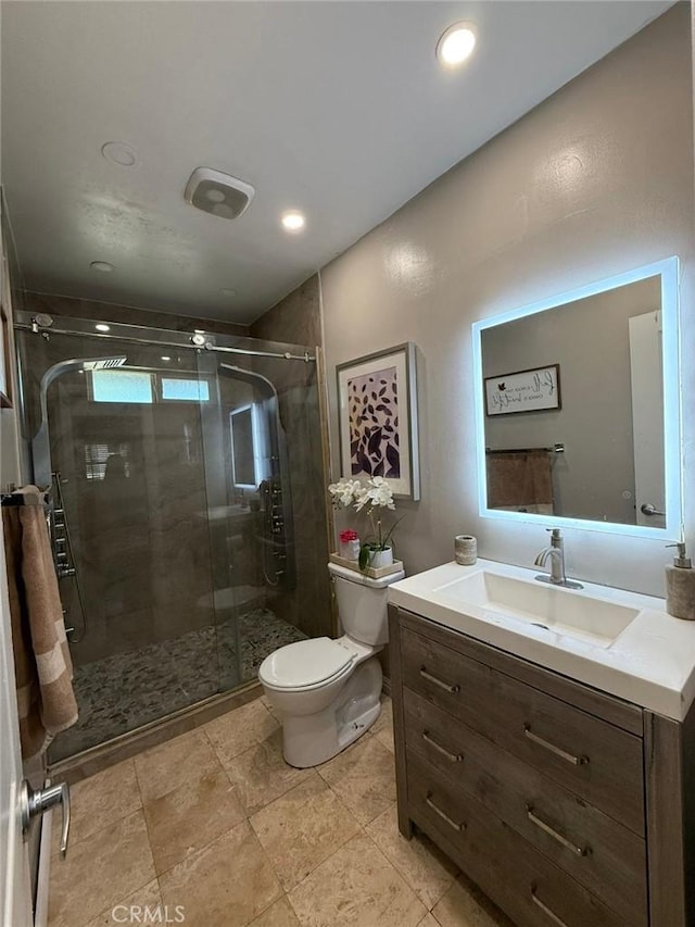 9617 Greenwood Ave, Montclair, CA 91763 - bathroom featuring toilet, vanity, a shower stall, and recessed lighting