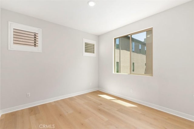 554 Catalonia, Lake Forest, CA 92630 - empty room with light wood finished floors, baseboards, and recessed lighting