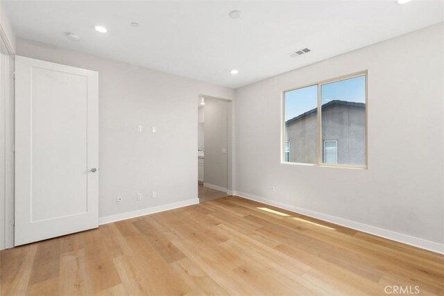 554 Catalonia, Lake Forest, CA 92630 - spare room with baseboards, light wood finished floors, recessed lighting, and a smoke detector
