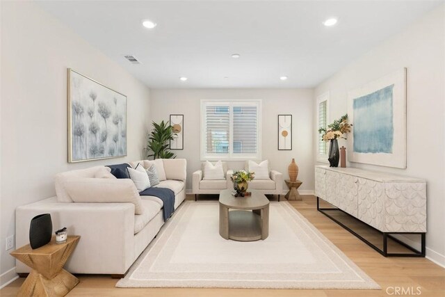 554 Catalonia, Lake Forest, CA 92630 - living area featuring light wood-type flooring, recessed lighting, and baseboards