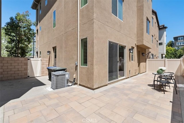 554 Catalonia, Lake Forest, CA 92630 - back of house with stucco siding and a patio