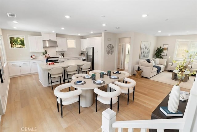 554 Catalonia, Lake Forest, CA 92630 - dining space featuring light wood-type flooring and recessed lighting