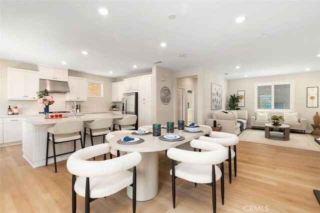 554 Catalonia, Lake Forest, CA 92630 - dining space featuring light wood-style floors, healthy amount of natural light, and recessed lighting