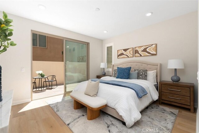 554 Catalonia, Lake Forest, CA 92630 - bedroom with access to outside, wood finished floors, and recessed lighting