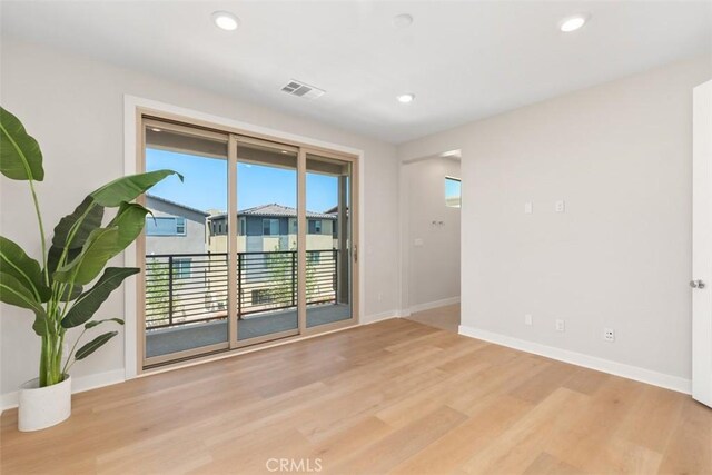 554 Catalonia, Lake Forest, CA 92630 - spare room with wood finished floors, baseboards, and recessed lighting