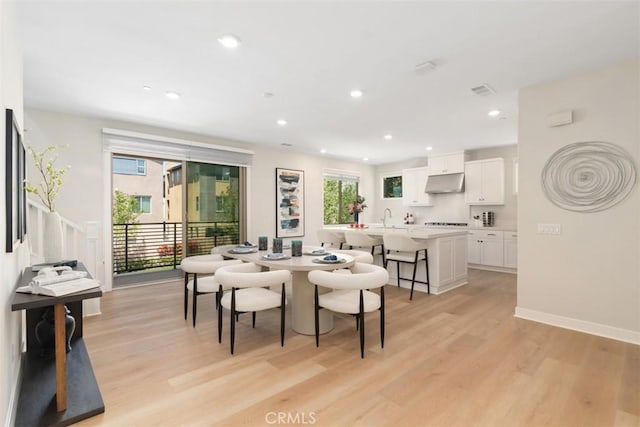 554 Catalonia, Lake Forest, CA 92630 - dining room with light wood-type flooring, recessed lighting, and baseboards