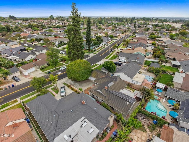 aerial view of residential area with a pool