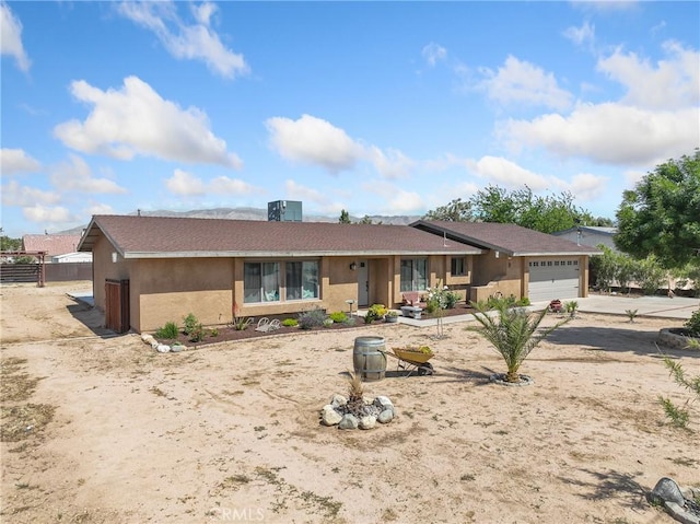 8149 Langdon Ave, Hesperia, CA 92345 - single story home featuring a garage, fence, concrete driveway, and stucco siding