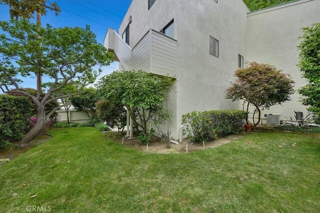 1467 18th St, Manhattan Beach, CA 90266 - view of side of home with central AC unit and stucco siding