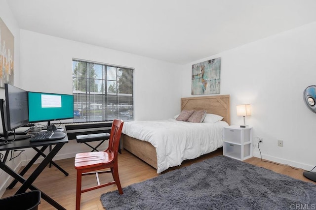 15048 Avenida Venusto Unit 255, San Diego, CA 92128 - bedroom with wood finished floors and baseboards
