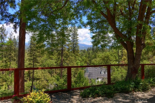 45792 Sutton Dr, Oakhurst, CA 93644 - gate with a forest view and fence