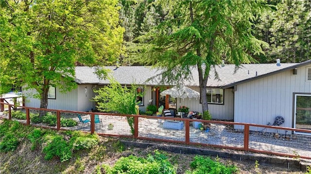 45792 Sutton Dr, Oakhurst, CA 93644 - back of house with roof with shingles