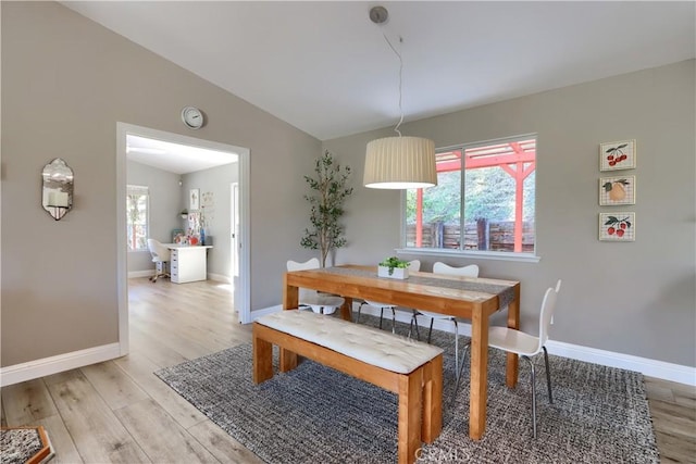 45792 Sutton Dr, Oakhurst, CA 93644 - dining room featuring baseboards, light wood-type flooring, and lofted ceiling
