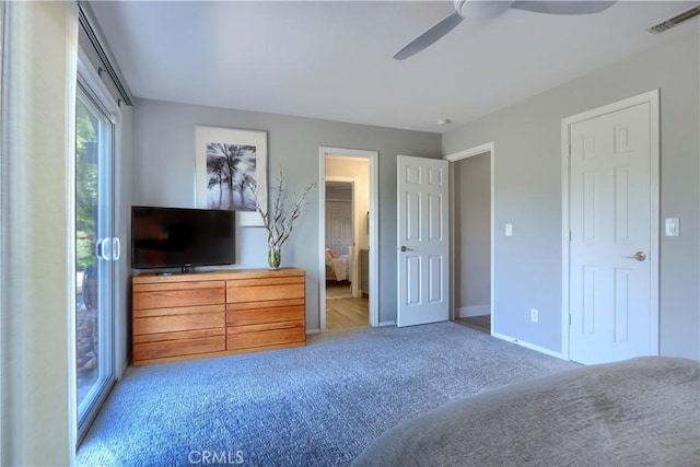 45792 Sutton Dr, Oakhurst, CA 93644 - carpeted bedroom with baseboards and a ceiling fan