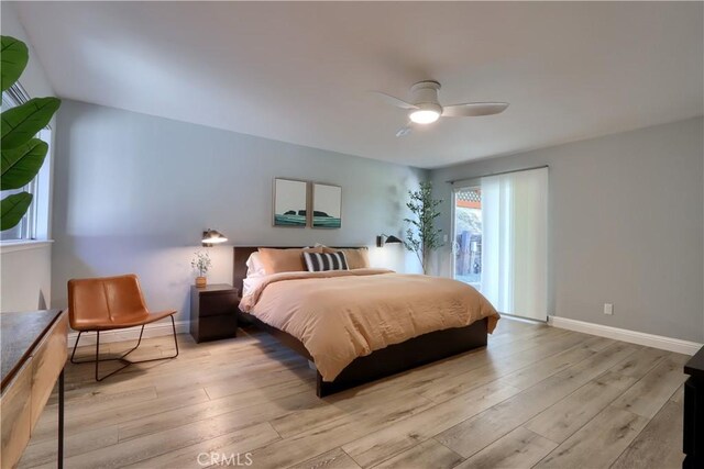45792 Sutton Dr, Oakhurst, CA 93644 - bedroom with baseboards, hardwood / wood-style flooring, and a ceiling fan
