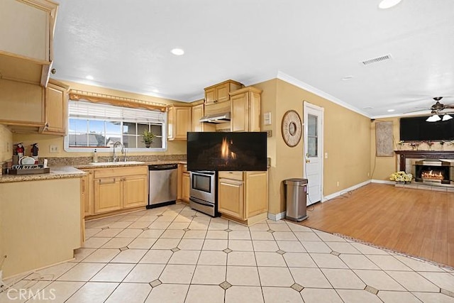 4340 Highland Ave, Oxnard, CA 93033 - kitchen featuring dishwasher, light brown cabinets, a sink, a ceiling fan, and open floor plan