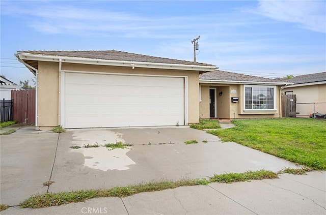 4340 Highland Ave, Oxnard, CA 93033 - view of front of property with stucco siding, concrete driveway, and an attached garage