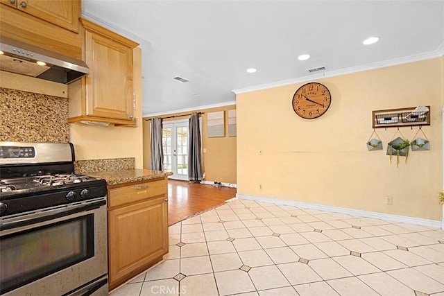 4340 Highland Ave, Oxnard, CA 93033 - kitchen with stainless steel range with gas cooktop, ornamental molding, wall chimney exhaust hood, recessed lighting, and baseboards