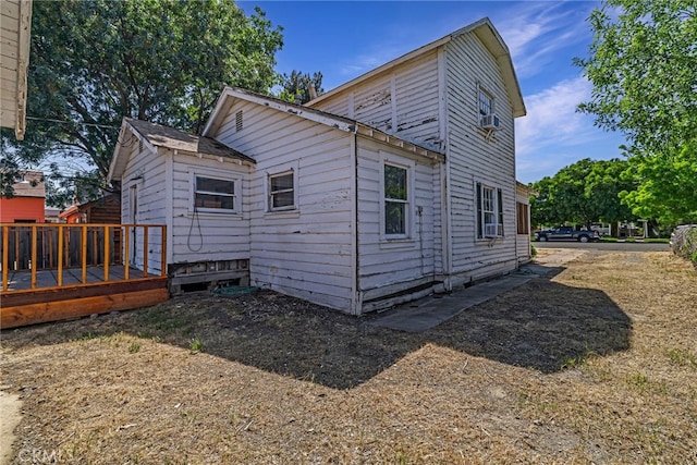 440 S Plumas St, Willows, CA 95988 - view of home's exterior featuring a wooden deck and cooling unit
