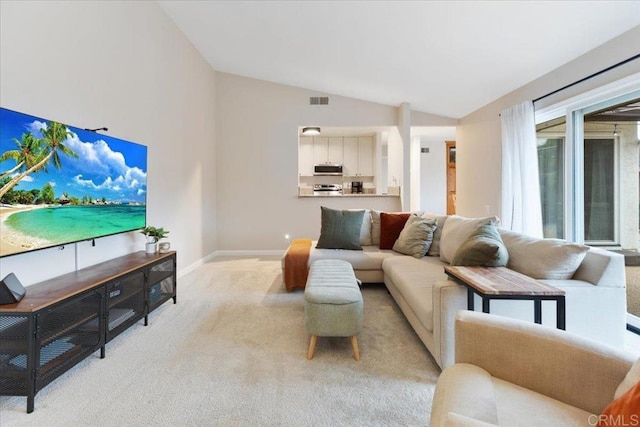 2150 Pepper Tree Pl, Escondido, CA 92026 - living area with vaulted ceiling, light colored carpet, and baseboards