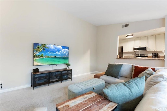 2150 Pepper Tree Pl, Escondido, CA 92026 - living room featuring baseboards and light colored carpet