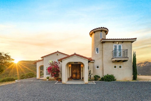 2389 Eric Rd, Fallbrook, CA 92028 - mediterranean / spanish home with stucco siding, a balcony, and a tile roof