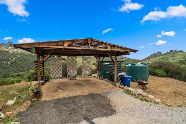 2389 Eric Rd, Fallbrook, CA 92028 - view of parking / parking lot featuring a detached carport and driveway