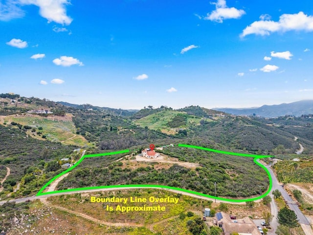 2389 Eric Rd, Fallbrook, CA 92028 - aerial view of property's location with a mountainous background and property boundaries highlighted