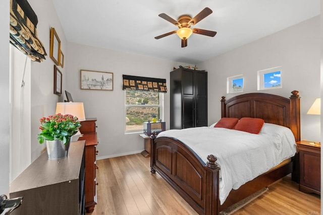 2389 Eric Rd, Fallbrook, CA 92028 - bedroom featuring light wood finished floors, baseboards, and ceiling fan