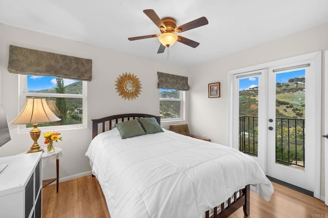2389 Eric Rd, Fallbrook, CA 92028 - bedroom featuring access to outside, light wood-style flooring, french doors, and a ceiling fan