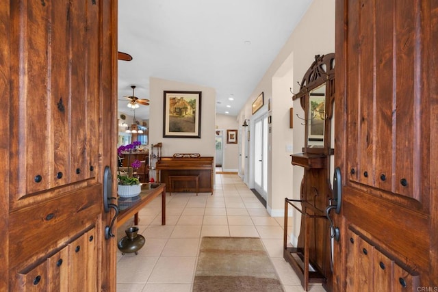 2389 Eric Rd, Fallbrook, CA 92028 - foyer entrance featuring light tile patterned flooring, ceiling fan, and baseboards