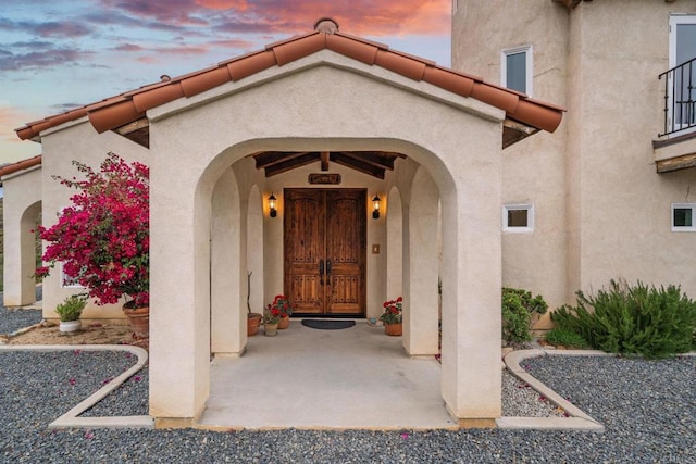 2389 Eric Rd, Fallbrook, CA 92028 - exterior entry at dusk with stucco siding