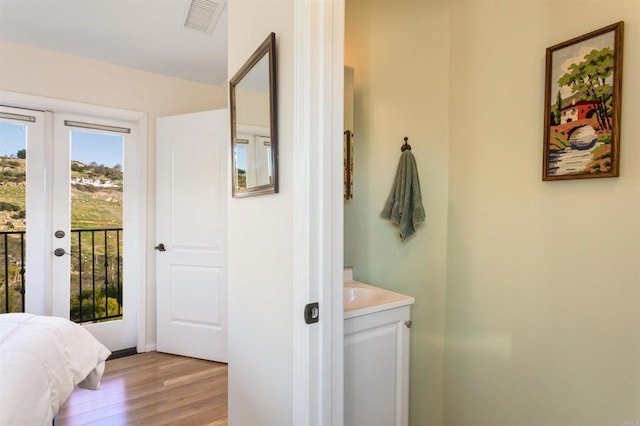 2389 Eric Rd, Fallbrook, CA 92028 - bedroom featuring access to outside and light wood finished floors