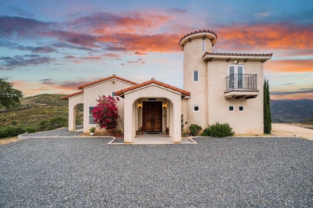 2389 Eric Rd, Fallbrook, CA 92028 - mediterranean / spanish-style home with a balcony, stucco siding, and a tiled roof