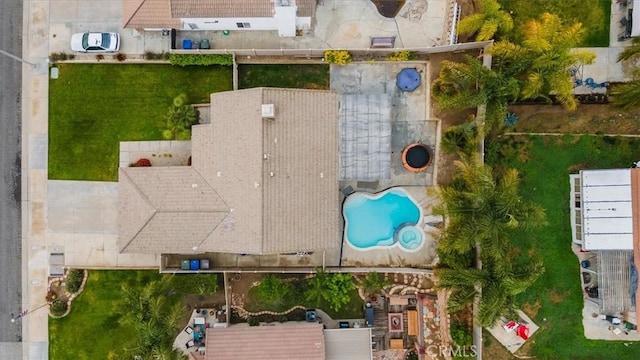 drone / aerial view of a pool area