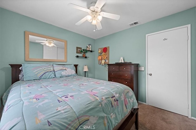 carpeted bedroom featuring ceiling fan