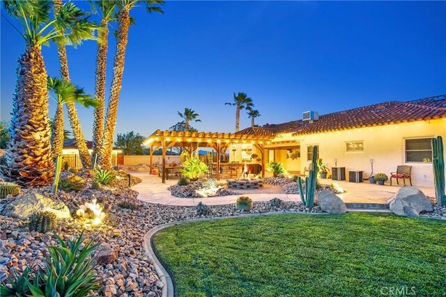 31024 Rabbit Springs Rd, Lucerne Valley, CA 92356 - view of yard featuring a patio area, a pergola, and an outdoor fire pit